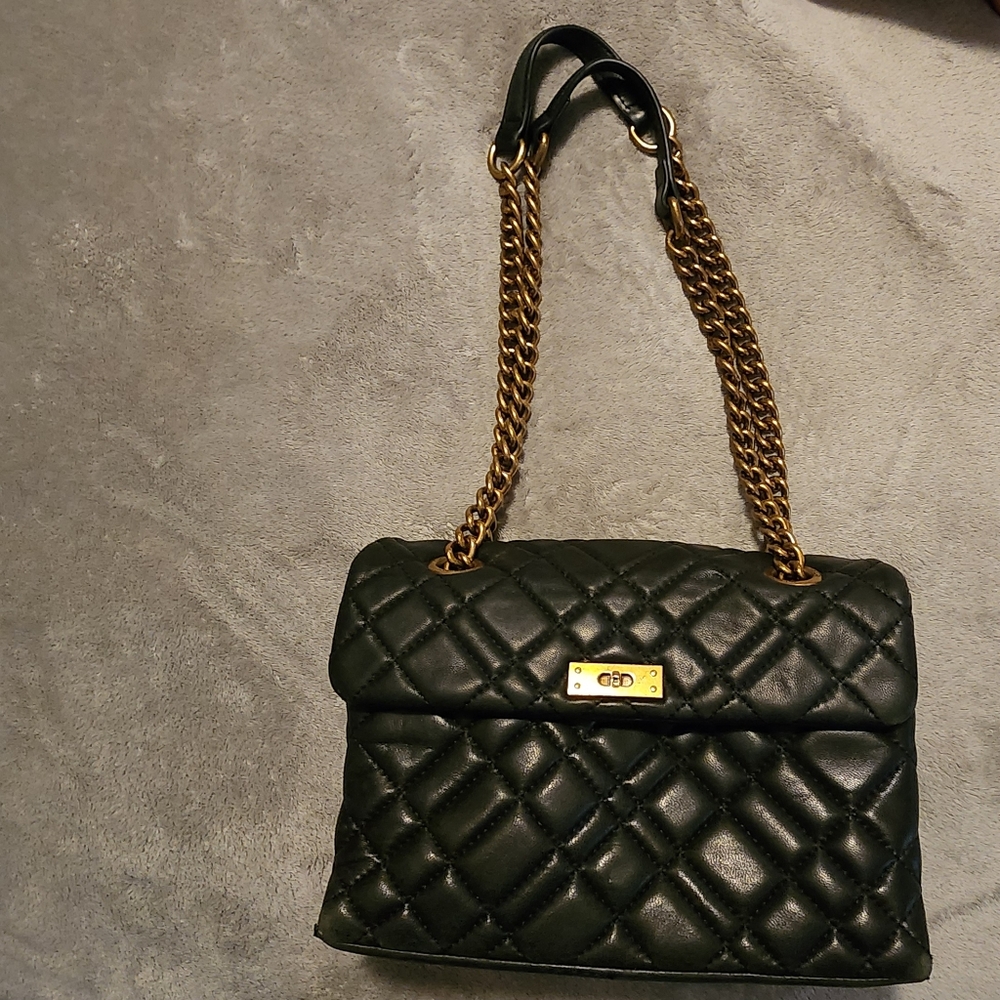 Kurt Gueiger black leather bag 10" x 7", gold hardware.